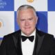 Former BBC presenter Huw Edwards charged with making indecent images of children