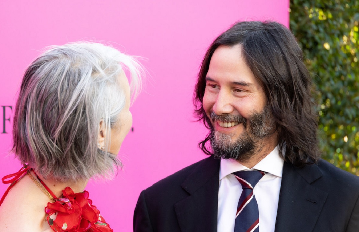 Keanu Reeves Looks Great On The Red Carpet, But Alexandra Grant Outshines Him With Gorgeous Dress In Rare Appearance